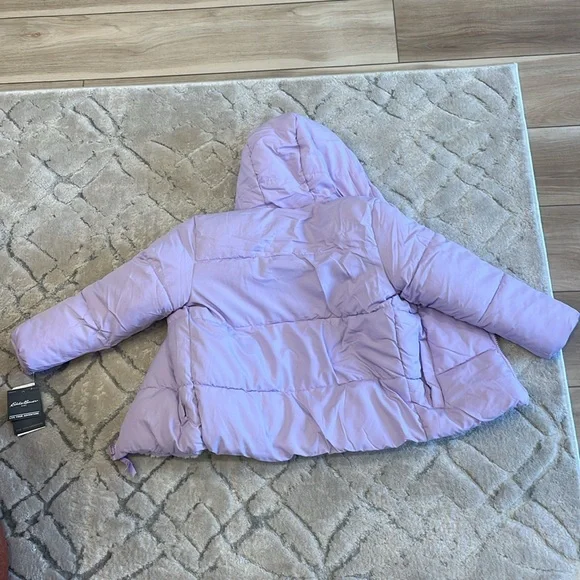 New Eddie Bauer girls jacket in size 6. Lilac purple.